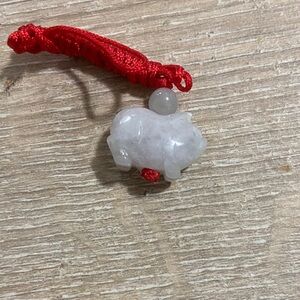 Carved White Jade Pig Charm with Red Silk Cord